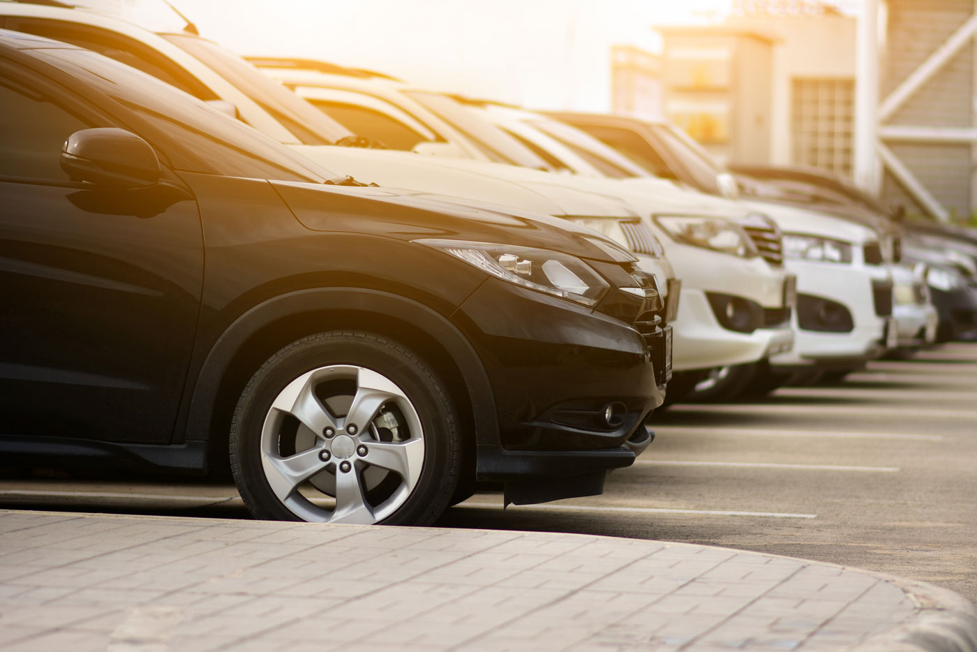 Photo of a row of cars in a car park